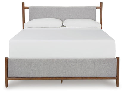 Lyncott California King Upholstered Bed with Mirrored Dresser and Nightstand